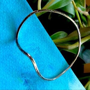 Wavy sterling silver bangle. Unmarked